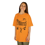 Young girl wearing a youth Gildan 5000B heavy cotton t-shirt in tennessee orange with a gymnastics text and graphic