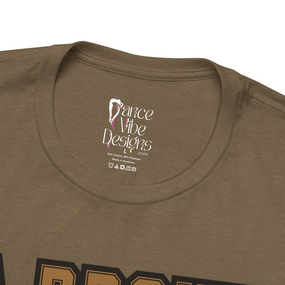 Close-up of a heather olive crewneck t-shirt's inner neck label printed with the brand Dance Vibe Designs logo above the care instructions.