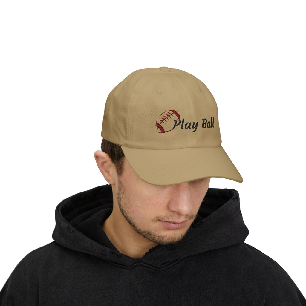 Man wearing a Khaki embroidered classic dad cap hat with Play Ball text and football graphic
