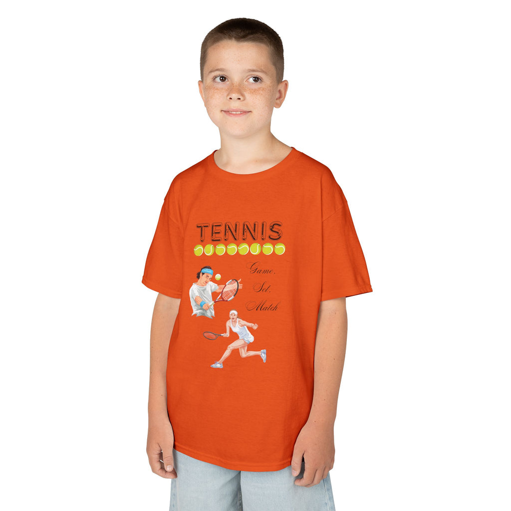 Young boy wearing a youth Gildan 5000B heavy cotton t-shirt in orange with a Tennis text and graphic