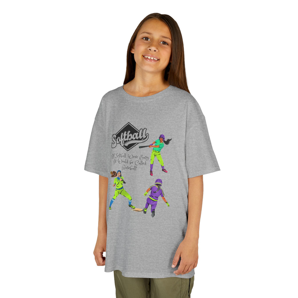 Young girl wearing a youth Gildan 5000B heavy cotton t-shirt in sport grey with a Softball text and graphic