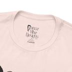 Close-up of a crewneck t-shirt showing the inner neck label with the brand Dance Vibe Designs printed above the care instructions.