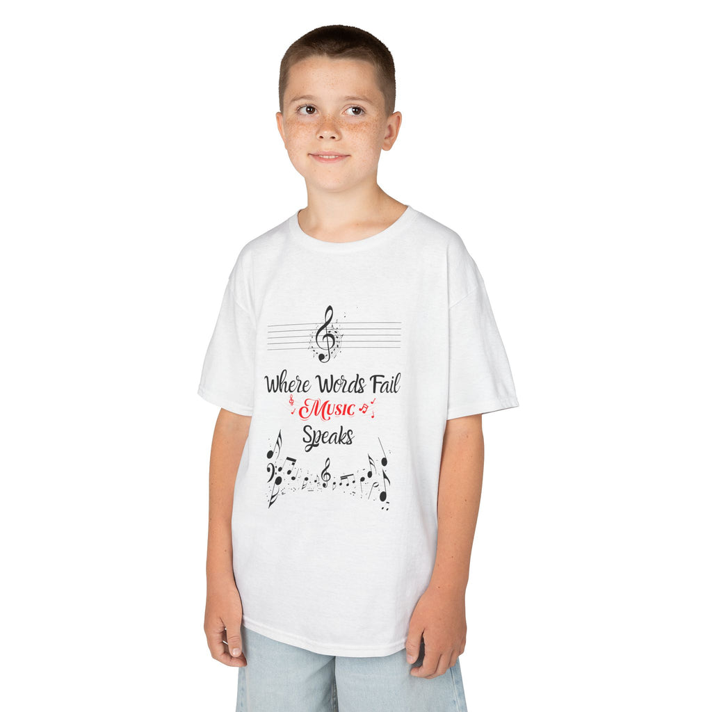 Young boy wearing a youth Gildan 5000B heavy cotton t-shirt in white with a Where Words Fail Music Speaks text and graphic