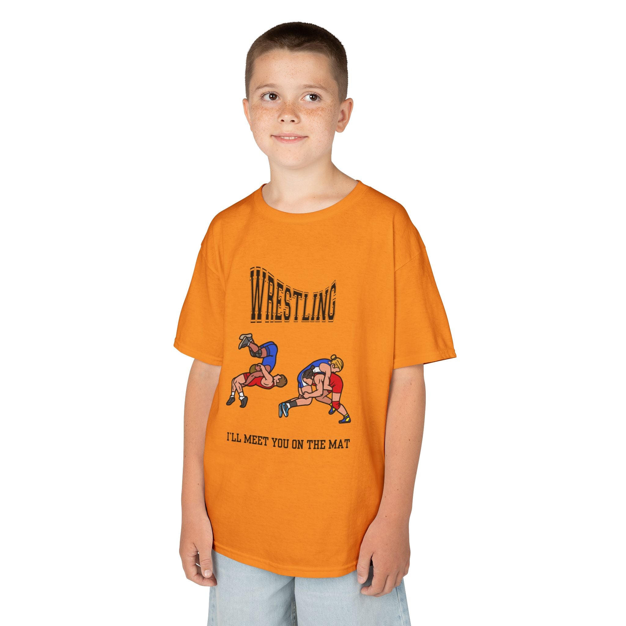 Young boy wearing a youth Gildan 5000B heavy cotton t-shirt in tennessee orange with a Wrestling text and graphic