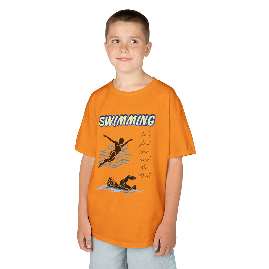 Young boy wearing a youth Gildan 5000B heavy cotton t-shirt in tennessee orange with a Swimming text and graphic