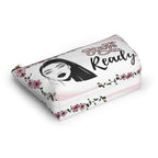 Makeup bag with face and floral design on a white background bottom view