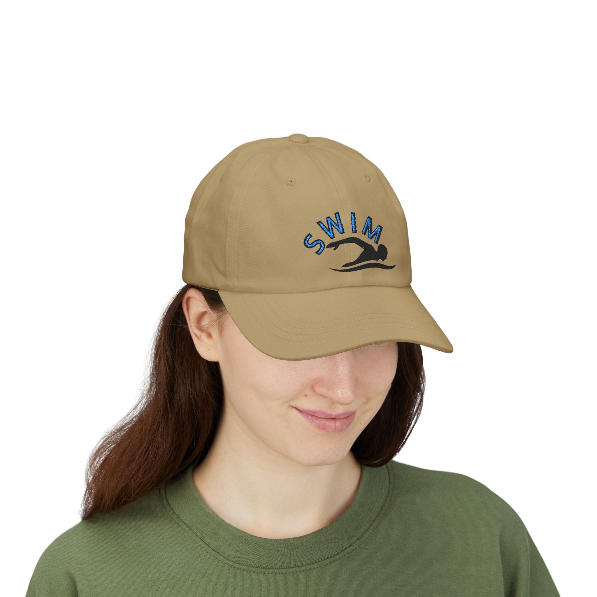 Woman wearing a khaki embroidered classic dad cap hat with a Swim text and graphic