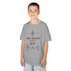 Young boy wearing a youth Gildan 5000B heavy cotton t-shirt in sport grey with a Where Words Fail Music Speaks text and graphic