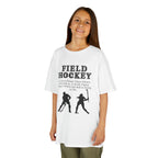 Young girl wearing a youth Gildan 5000B heavy cotton t-shirt in white with a Field Hockey text and graphic
