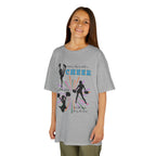 Young girl wearing a youth Gildan 5000B heavy cotton t-shirt in sport grey with a Cheer Team design