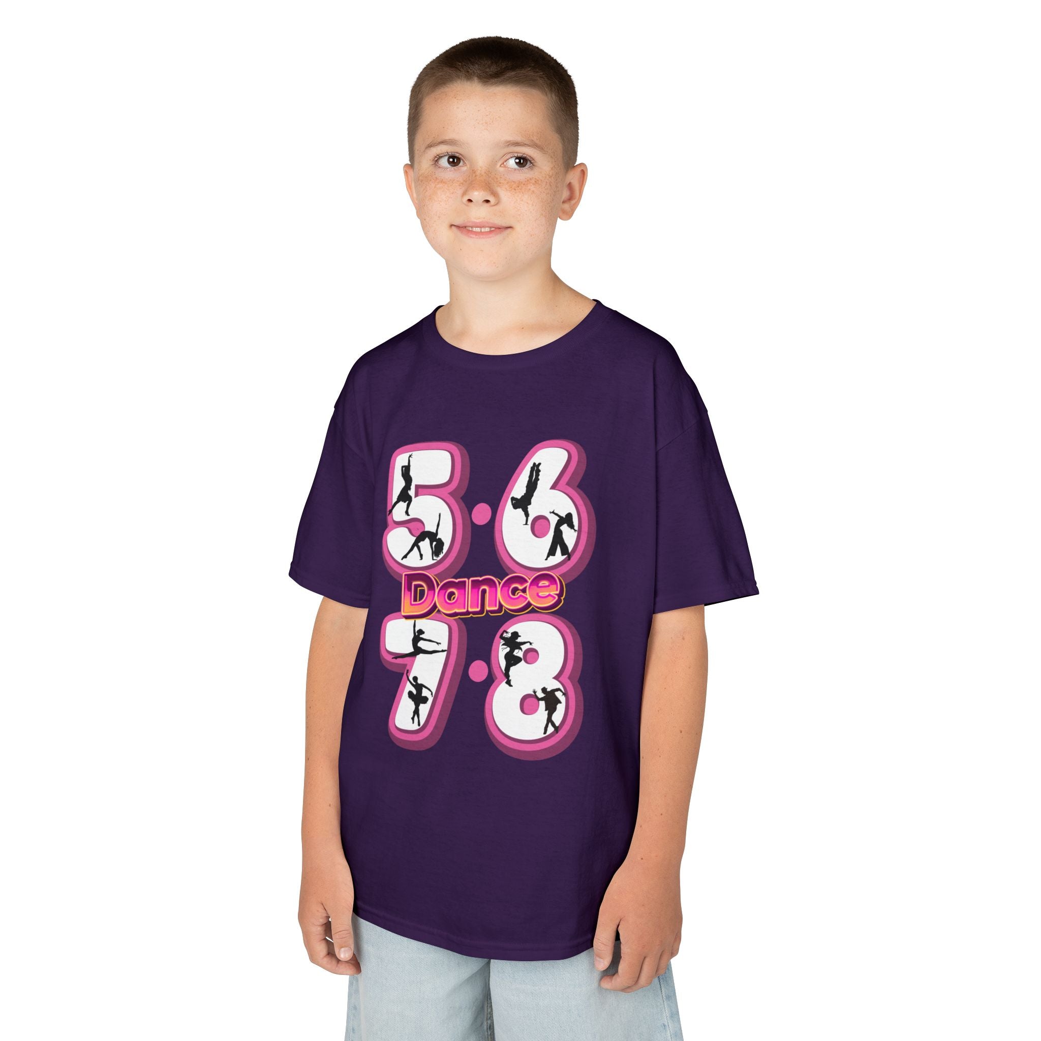 Young boy wearing a Gildan 5000B heavy cotton t-shirt in purple with a 5678 Dance text and graphic