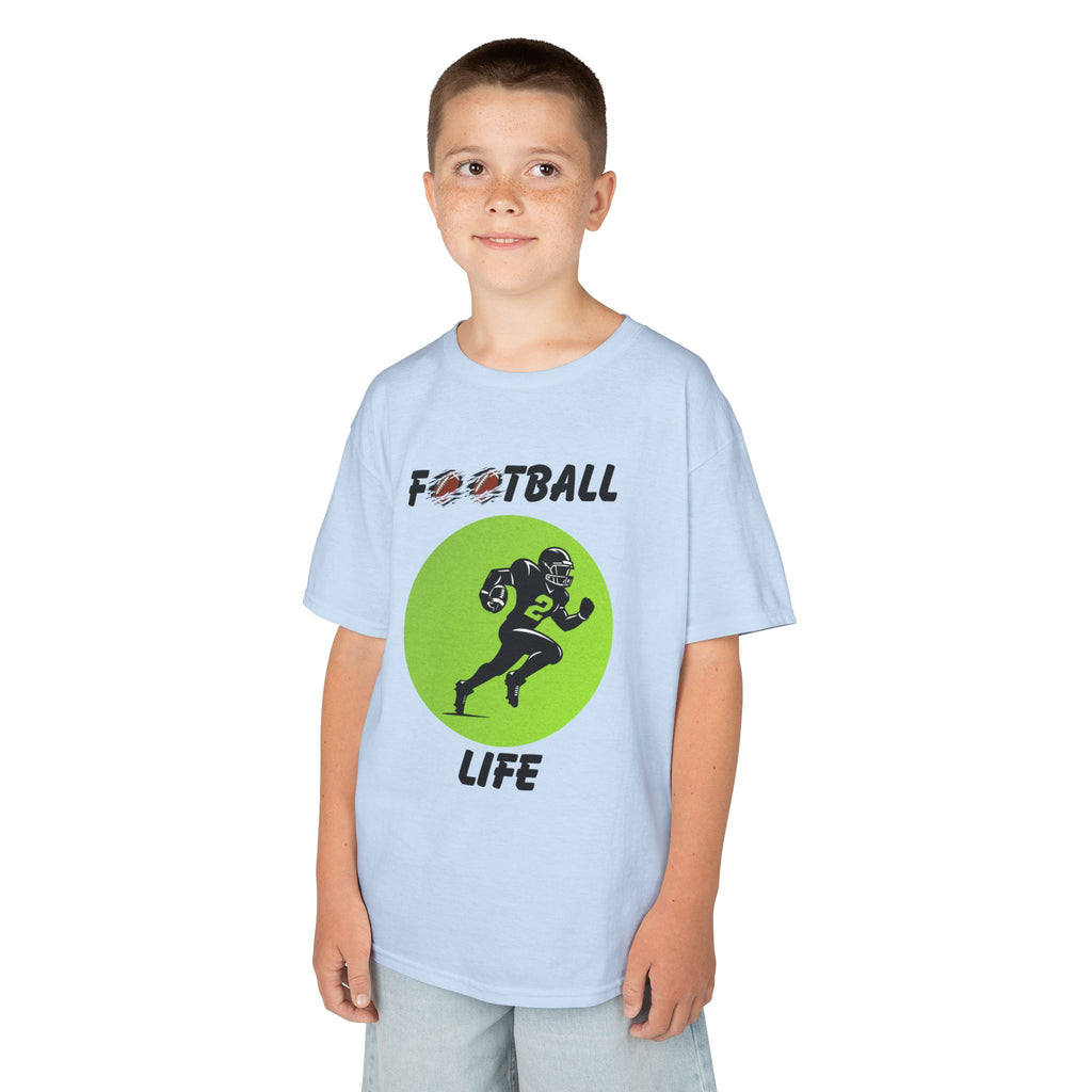 Young boy wearing a youth Gildan 5000B heavy cotton t-shirt in light blue with a Football Life text and graphic