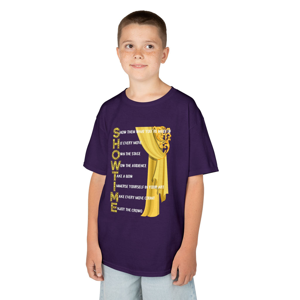 Young boy wearing a youth Gildan 5000B heavy cotton t-shirt in purple with a Showtime text and graphic 