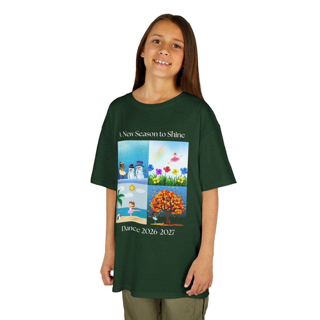 Young girl wearing a youth Gildan 5000B heavy cotton t-shirt in forest green with an A New Season to Shine Dance 2026-2027 theme