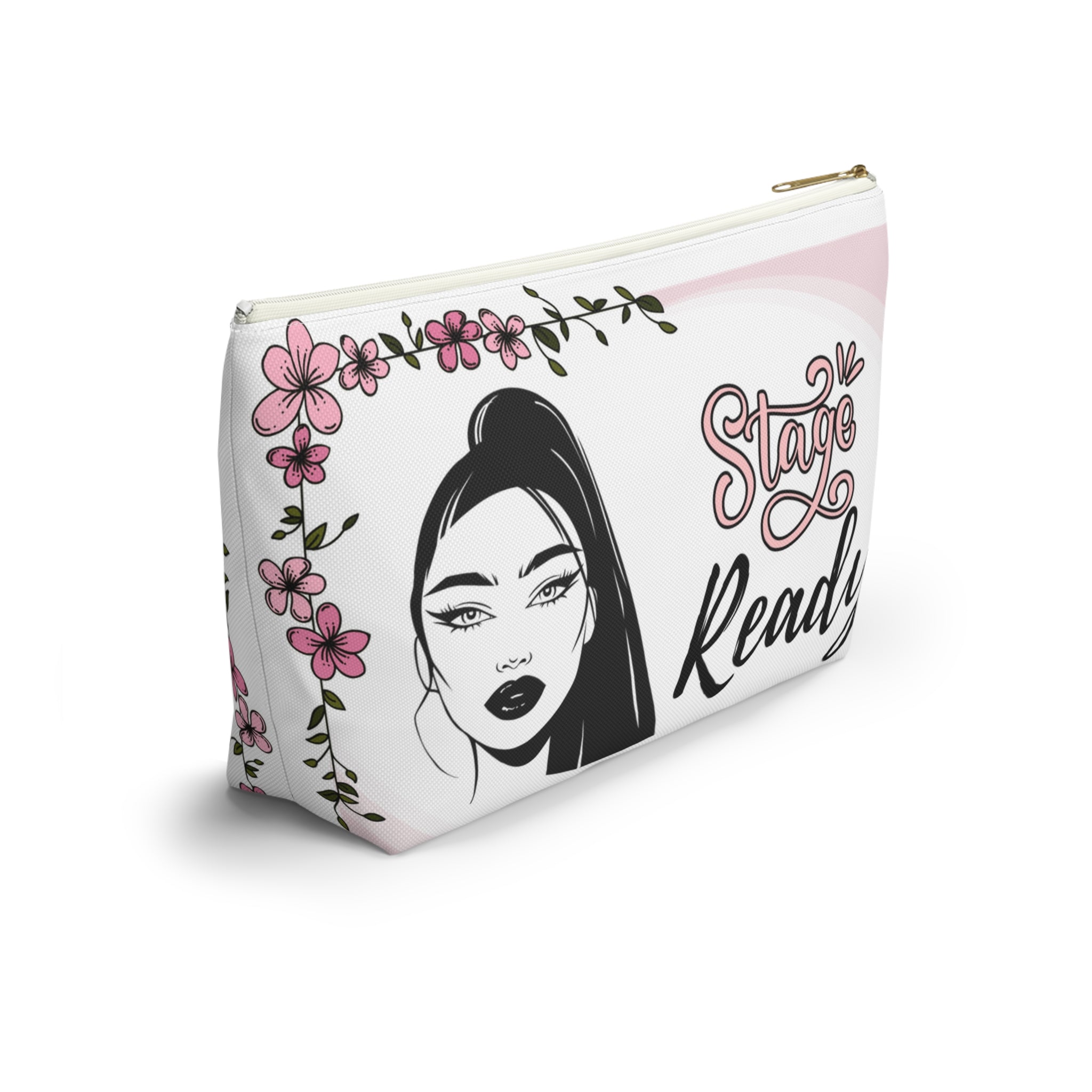 Makeup bag with a stylized face, flowers, and 'Stay Ready' text on a white background with white zipper side view