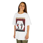 Young girl wearing a youth Gildan 5000B heavy cotton t-shirt in white with a Broadway text and graphic