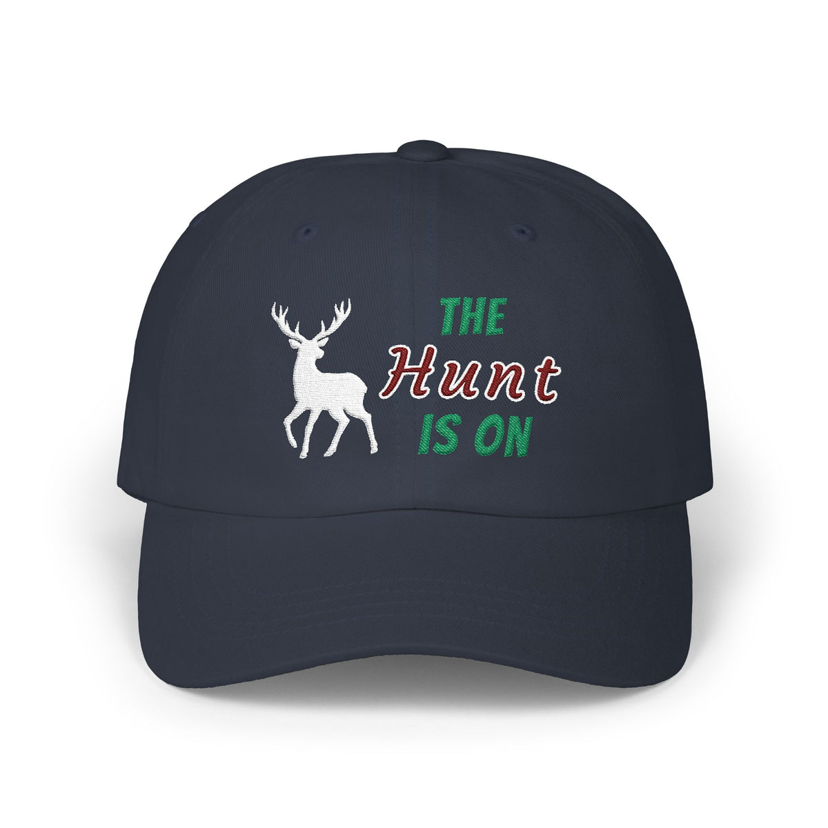 Navy embroidered classic dad cap hat with The Hunt is On text and hunting graphic Front view
