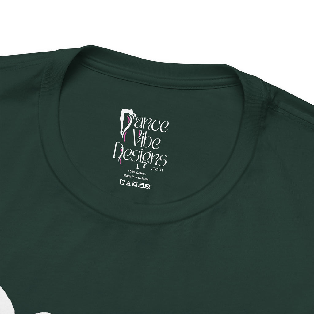 Close-up of a crewneck t-shirt showing the inner neck label with the Dance Vibe Designs logo above the care instructions.