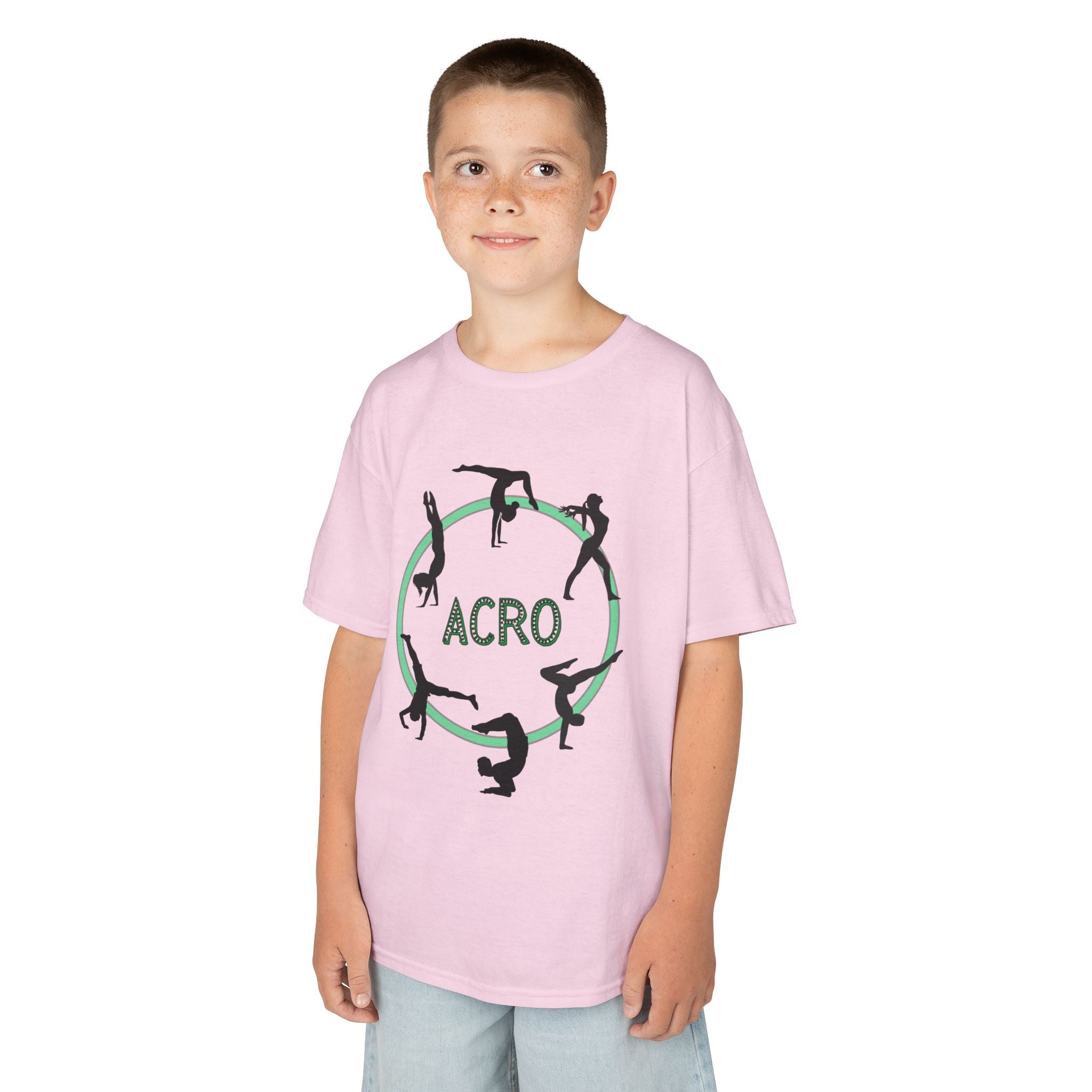 Young boy wearing a youth Gildan 5000B heavy cotton t-shirt in light pink with an Acro Gymnastics theme