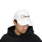 Man wearing a white embroidered classic dad cap hat with Play Ball text and baseball graphic