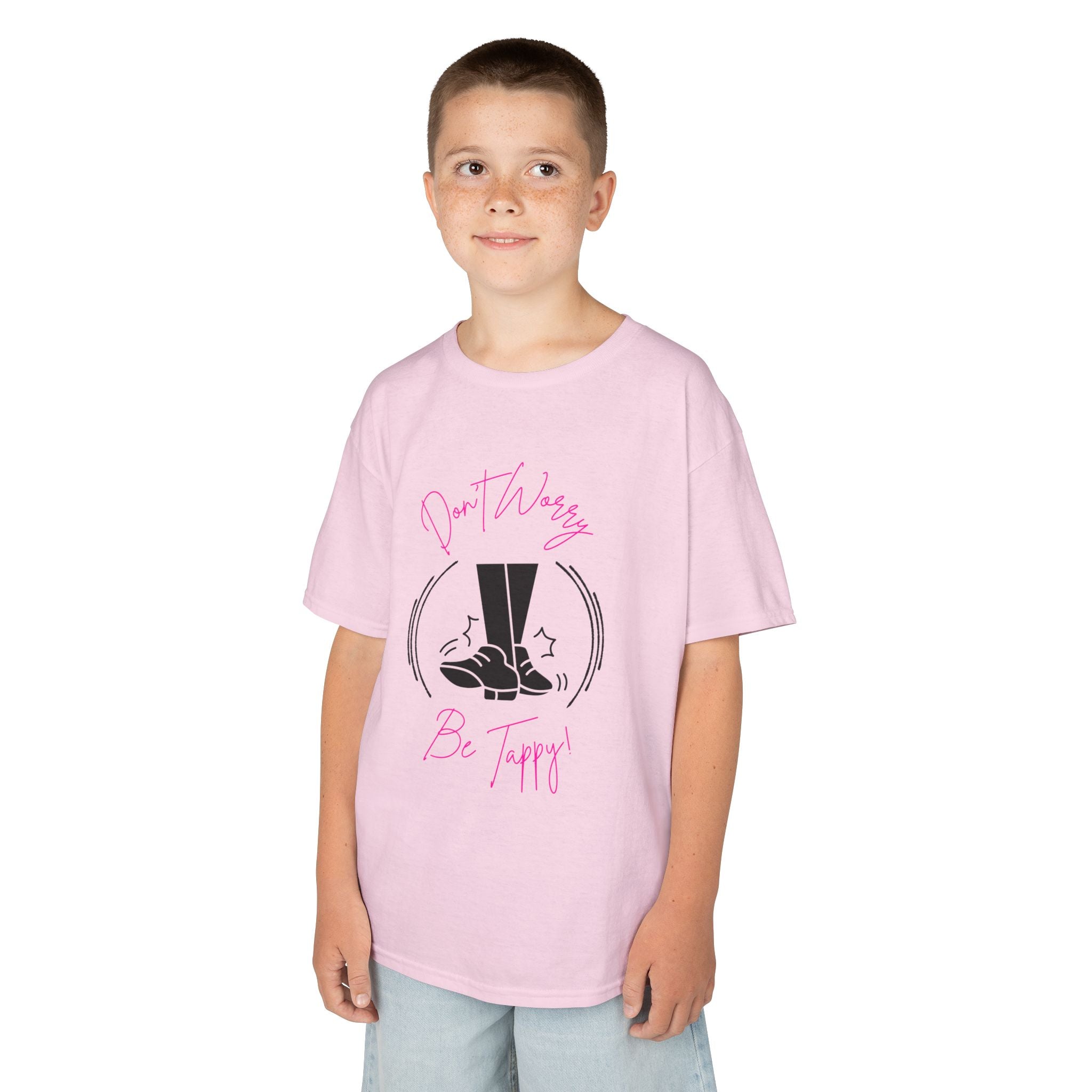 Young boy wearing a youth Gildan 5000B heavy cotton t-shirt in light pink with a Don't Worry Be Tappy Tap Shoe design