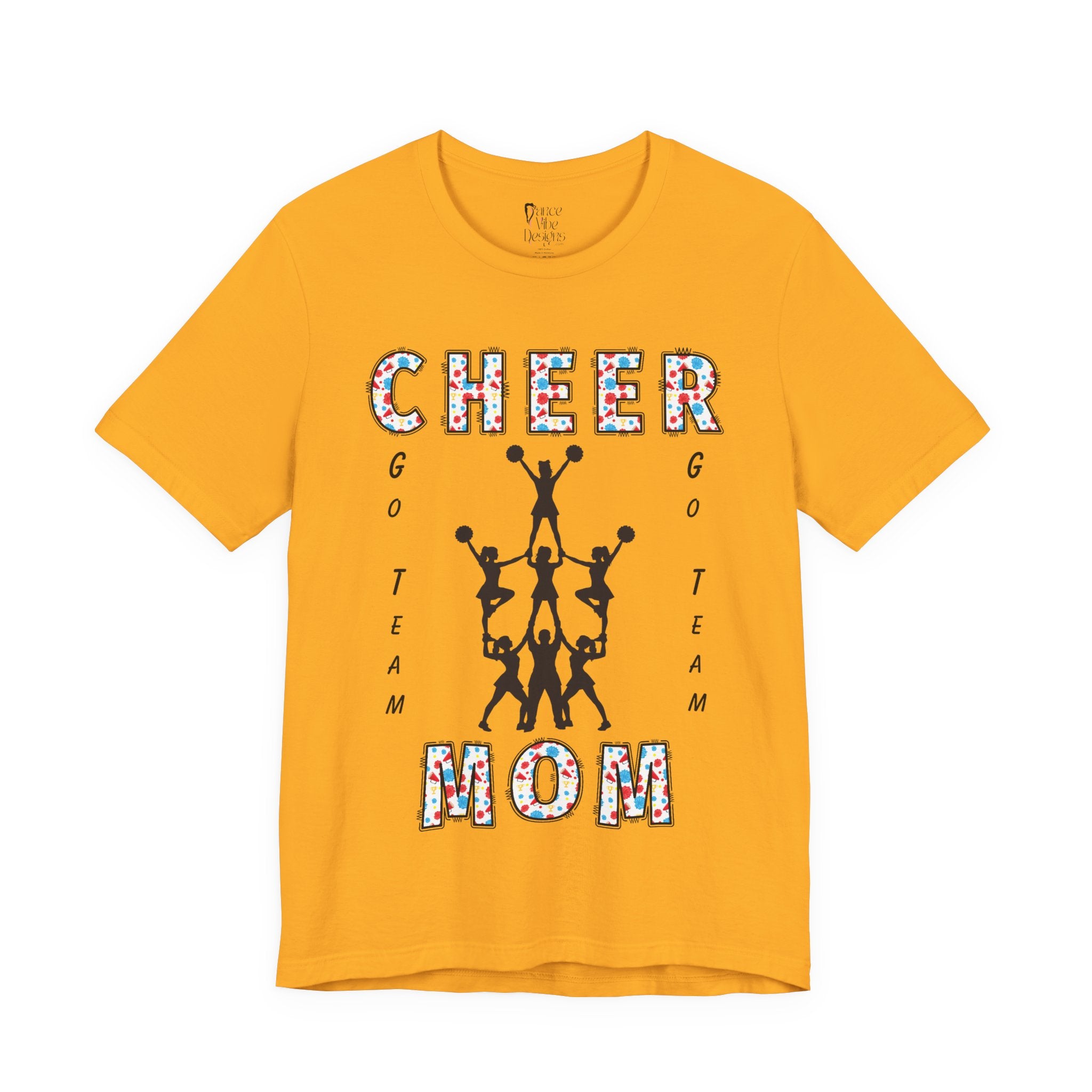 A gold short-sleeve crewneck t-shirt featuring a CHEER GO TEAM MOM graphic on the front. 