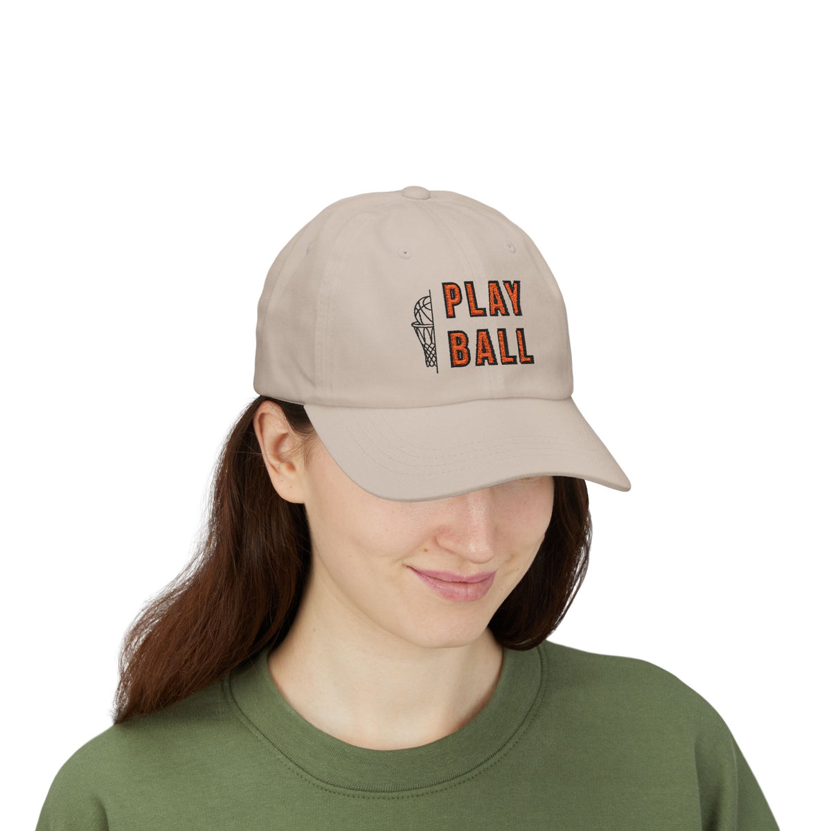 Woman wearing a stone embroidered classic dad cap hat with Play Ball text and basketball graphic 