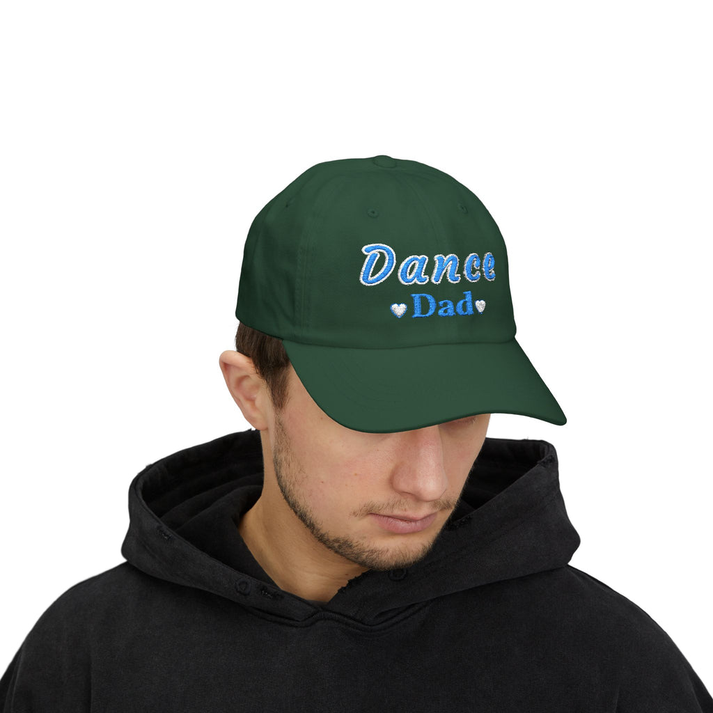 Man wearing a spruce embroidered classic dad cap hat with a Dance Dad text and graphic