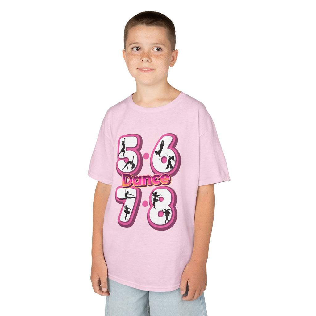 Young boy wearing a Gildan 5000B heavy cotton t-shirt in light pink with a 5678 Dance text and graphic