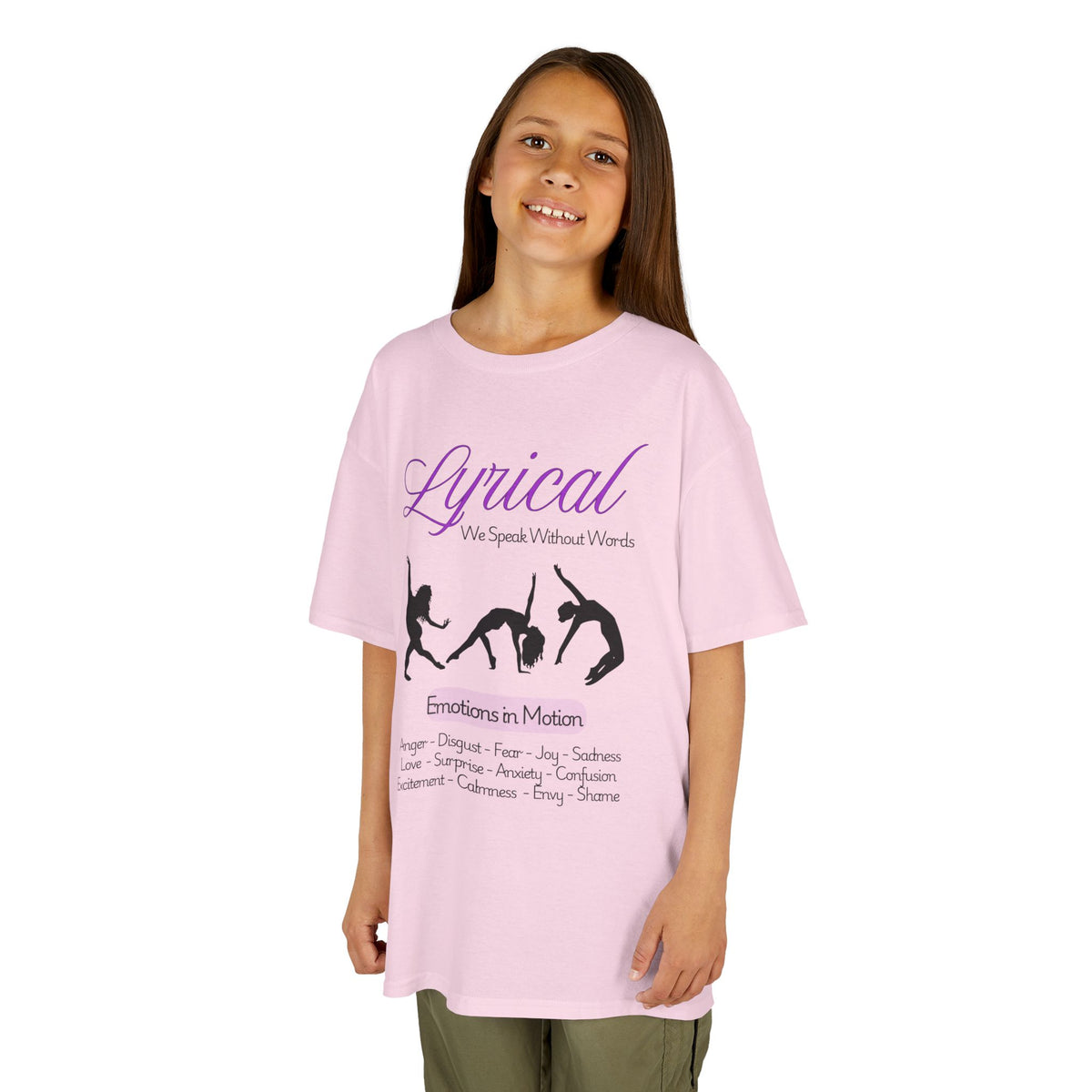 Young girl wearing a youth Gildan 5000B heavy cotton t-shirt in light pink with a Lyrical Dance graphic and text