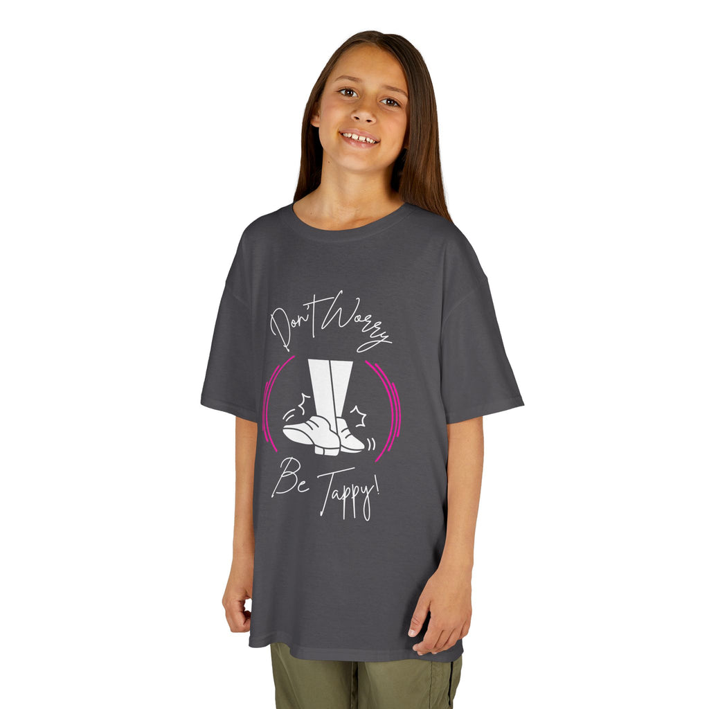 Young girl wearing a youth Gildan 5000B heavy cotton t-shirt in charcoal with a Don't Worry Be Tappy Tap Shoe design