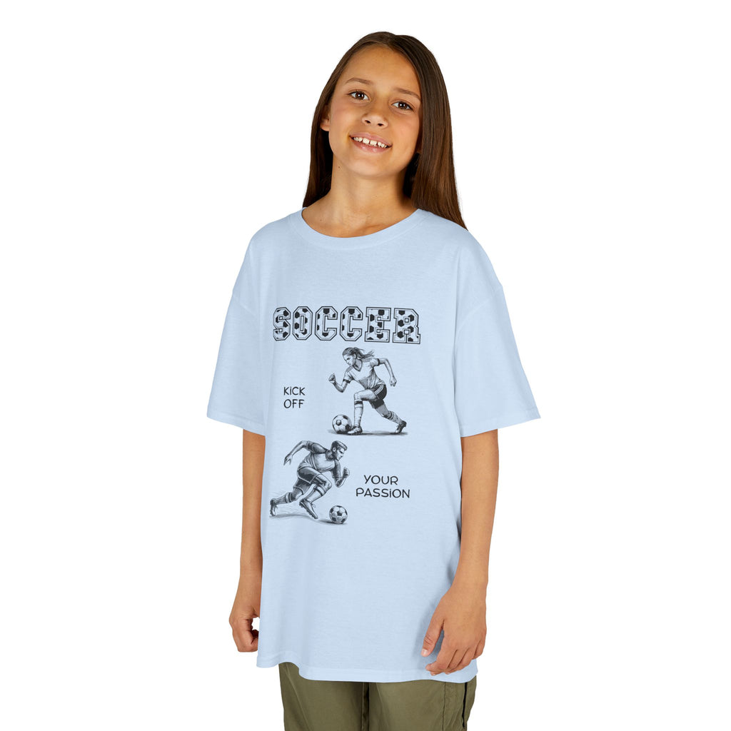 Young girl wearing a youth Gildan 5000B heavy cotton t-shirt in light blue with a Soccer text and graphic