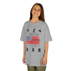 Young girl wearing a youth Gildan 5000B heavy cotton t-shirt in sport grey with a National Dance Day theme