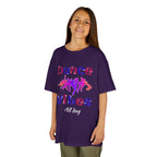 Young girl wearing a youth Gildan 5000B heavy cotton t-shirt in purple with a Dance Vibes All Day text and graphic