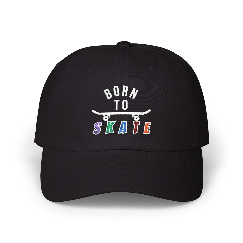 A black baseball cap featuring a graphic on the front that reads BORN TO SKATE with a skateboard illustration. 