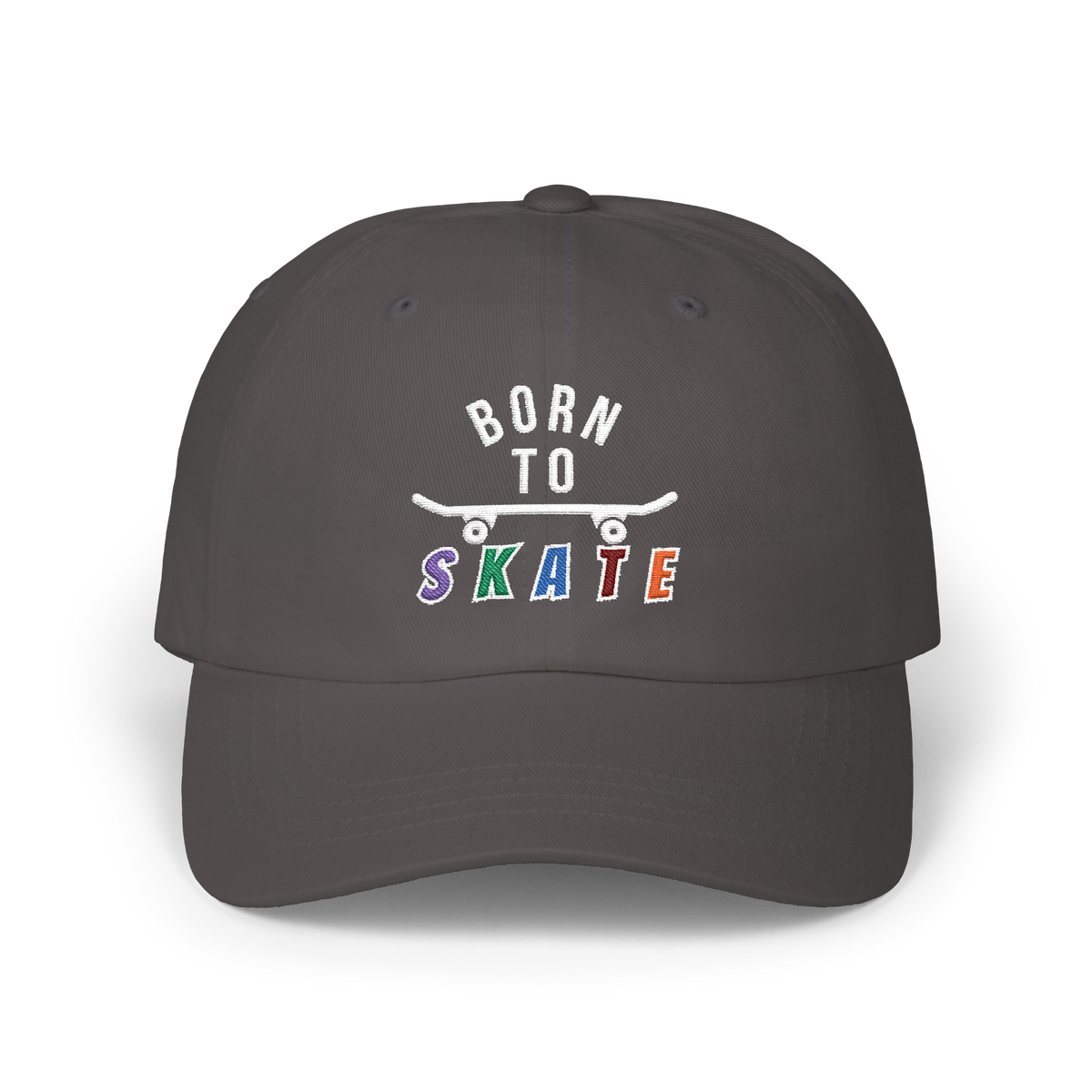A dark grey baseball cap featuring a graphic on the front that reads BORN TO SKATE with a skateboard illustration. 