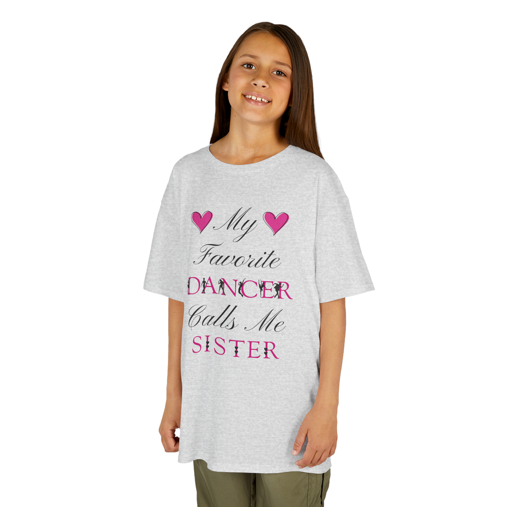 Young girl wearing an ash short-sleeve t-shirt with a graphic text print on the front that reads My Favorite Dancer Calls Me Sister.