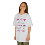 Young girl wearing an ash short-sleeve t-shirt with a graphic text print on the front that reads My Favorite Dancer Calls Me Sister.
